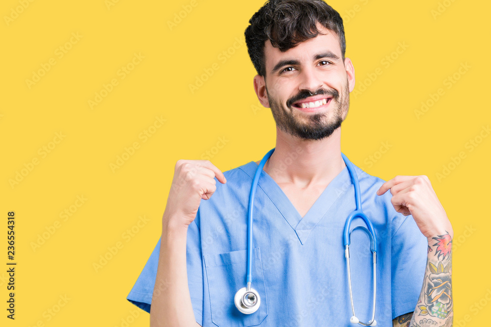 Young handsome nurse man wearing surgeon uniform over isolated background looking confident with smile on face, pointing oneself with fingers proud and happy. Young handsome nurse man wearing surgeon uniform over isolated background looking confident with smile on face, pointing oneself with fingers proud and happy.