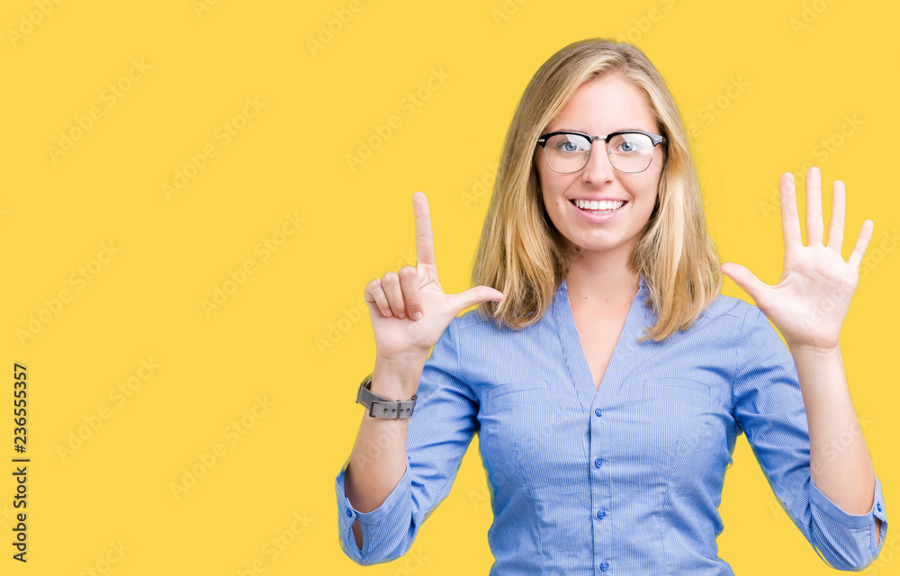 Beautiful young business woman over isolated background showing and pointing up with fingers number seven while smiling confident and happy. Beautiful young business woman over isolated background showing and pointing up with fingers number seven while smiling confident and happy.