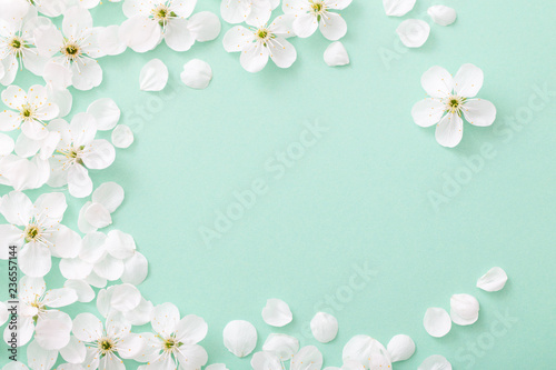 Fototapeta Naklejka Na Ścianę i Meble -  cherry flowers on paper background