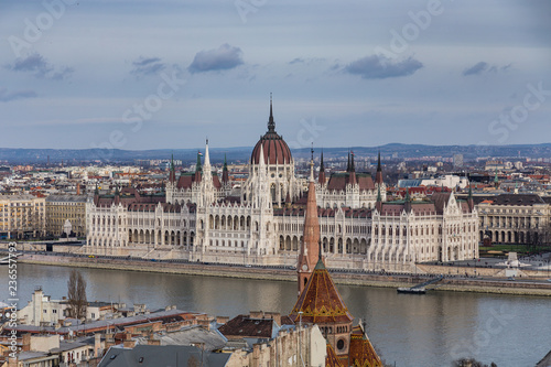 view of the embankment of the river Danube and old Parliament building in Budapest , Hungary