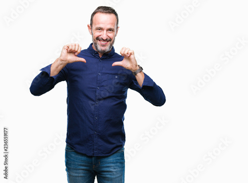 Middle age hoary senior man over isolated background looking confident with smile on face, pointing oneself with fingers proud and happy.