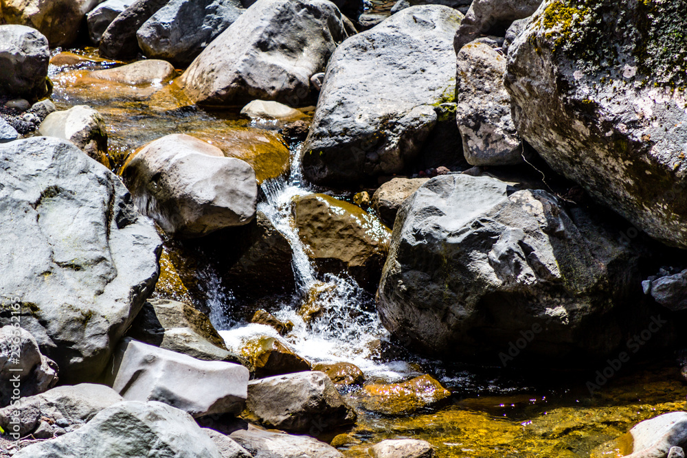 Water flows through a rocky river bed, Edgemont National Park, New Zealand Water flows through a rocky river bed, Edgemont National Park, New Zealand