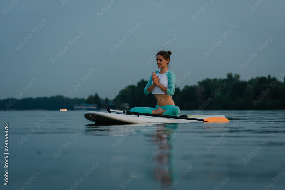 Paddle board yoga