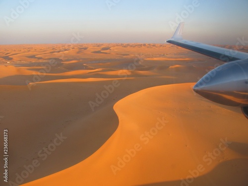 Flying over a sand dune in the Sahara Desert in Algeria
