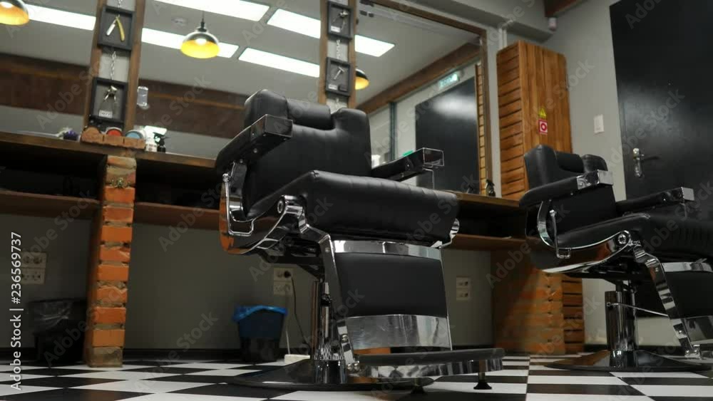 Barber customer meeting and discussing haircut. Barber customer meeting and discussing haircut.
