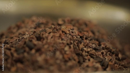 Pile of Cacao Nibs or Chips in a Cauldron, Focus Wanders from Back- to Foreground, Closeup