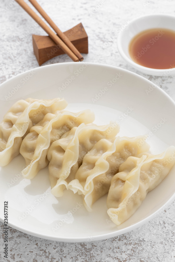 Japanese Gyoza with pork meat and on a plate Japanese Gyoza with pork meat and on a plate