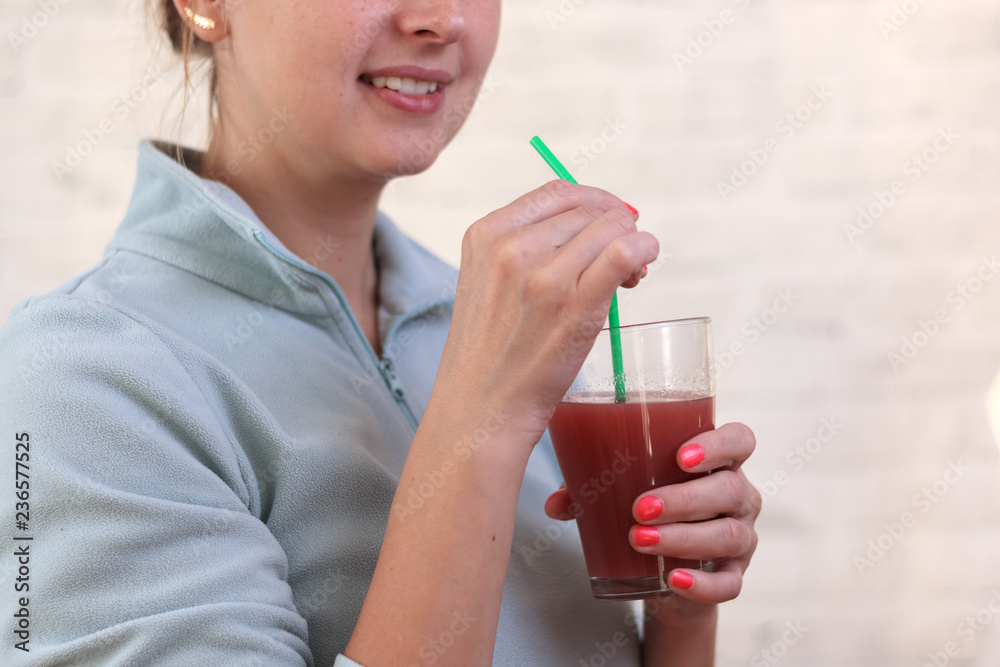 Woman drinking fresh raw red detox vegetable juice. Healthy lifestyle Woman drinking fresh raw red detox vegetable juice. Healthy lifestyle