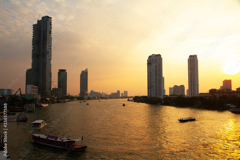 Fototapeta premium Cityscape and River sunset Bangkok city skyline Asia Thailand