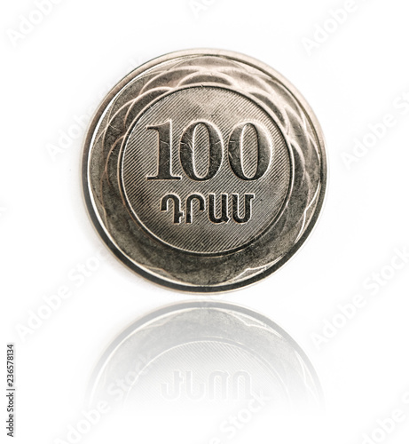 Armenian money, сoin averse on white background. One hundred dram, AMD currency, macro view. Finance, banking and business in Armenia concept.