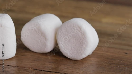 One Marshmallow crashes into other Marshmallows, Closeup
