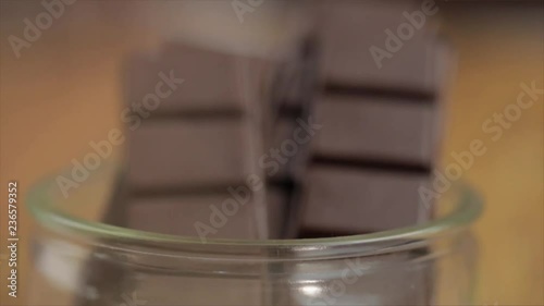 Chocolate Bars in a glass bowl, from Blurred to Sharp Focus, Closeup