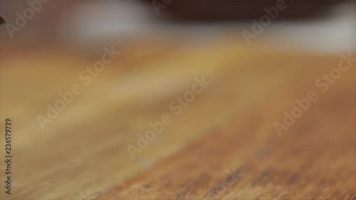 Glass Bowl with Chocolate Bars is Wandering Through the Picture, Closeup