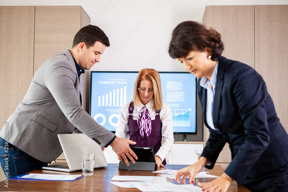 Corporate business team and manager in a meeting, close up. Great minds. Corporate business team and manager in a meeting, close up. Great minds.