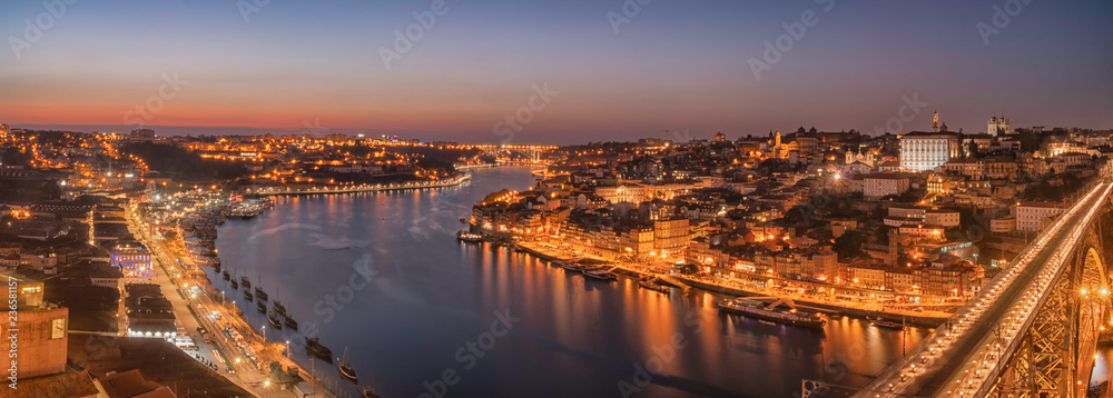 view of the city of porto in portugal from the bridge dom luis at night panoramic shoot