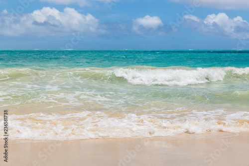 Beautiful Waimanalo beach with turquoise water and cloudy sky  Oahu coastline  Hawaii