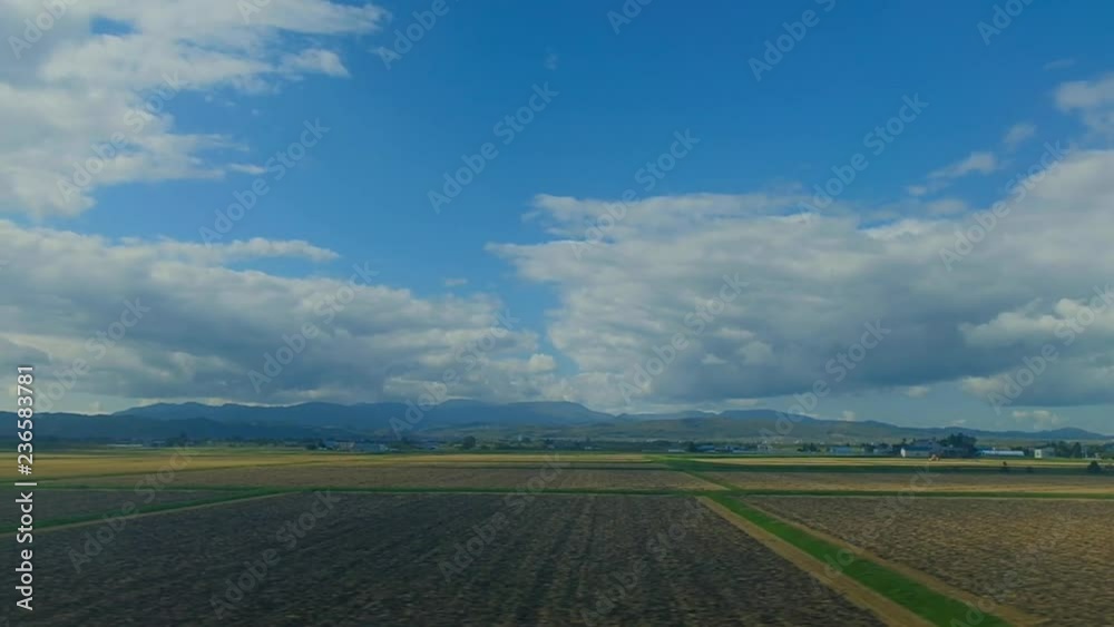 Scenery of Japan Coutryside, View from the Train, Blue Sky with Cloud, Dolly Shot Scenery of Japan Coutryside, View from the Train, Blue Sky with Cloud, Dolly Shot