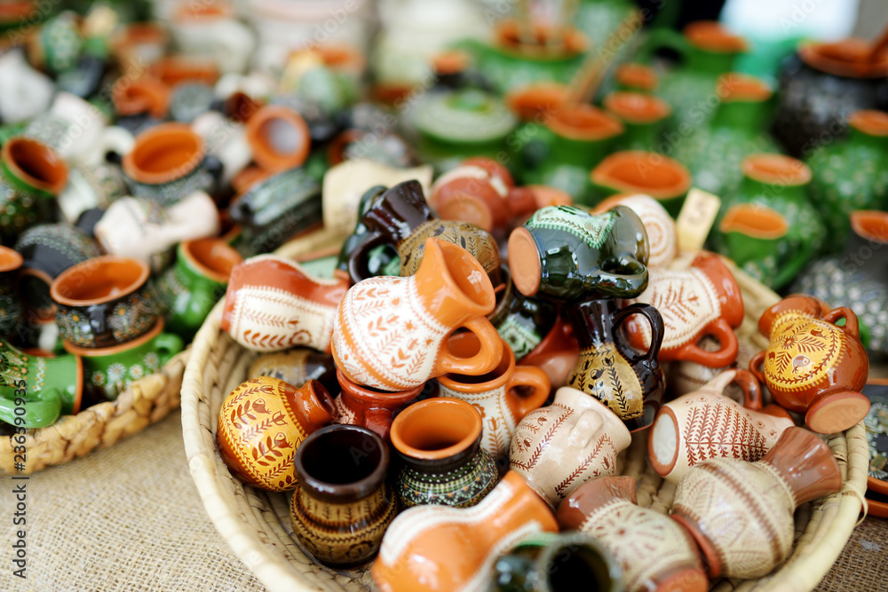 Ceramic dishes, tableware and jugs sold on Easter market in Vilnius. Lithuanian capital's traditional crafts fair is held every March on Old Town streets.