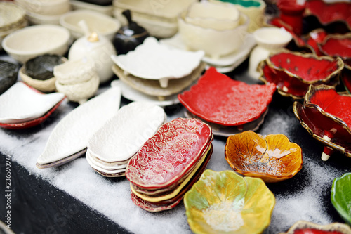 Ceramic dishes, tableware and jugs sold on Easter market in Vilnius. Lithuanian capital's traditional crafts fair is held every March on Old Town streets.