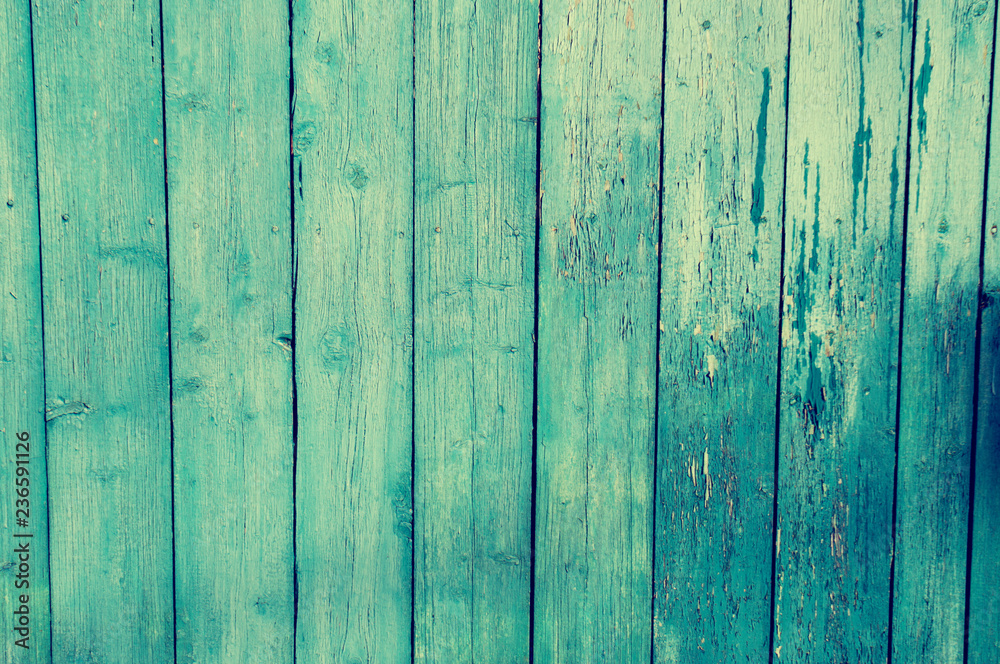 Texture of old blue green tree. Wooden texture background with scuffs, scratches, peeling paint. Background with place for text. Texture of old blue green tree. Wooden texture background with scuffs, scratches, peeling paint. Background with place for text.
