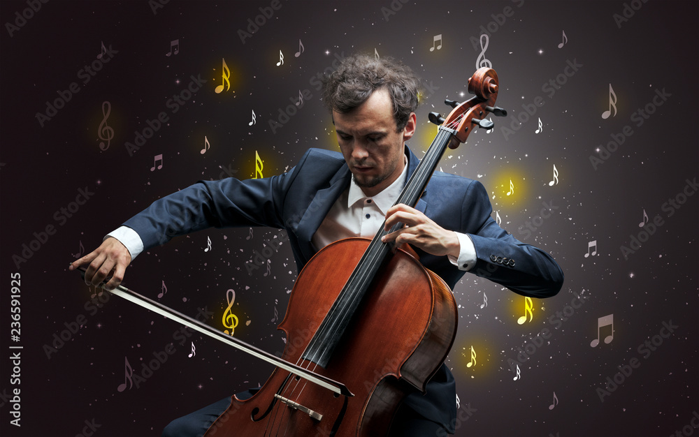 Fototapeta premium Young cellist with falling musical notes wallpaper and classical concept