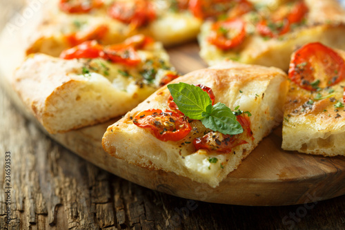 Tomato focaccia with fresh basil
