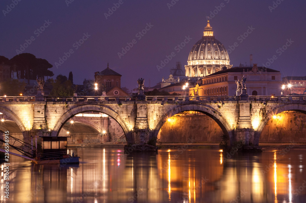 Night image of St. Peter's Basilica, Ponte Sant Angelo and Tiber River in Rome
