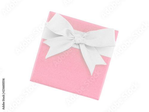 top view of single pastel pink gift box with ribbon bow isolated on white