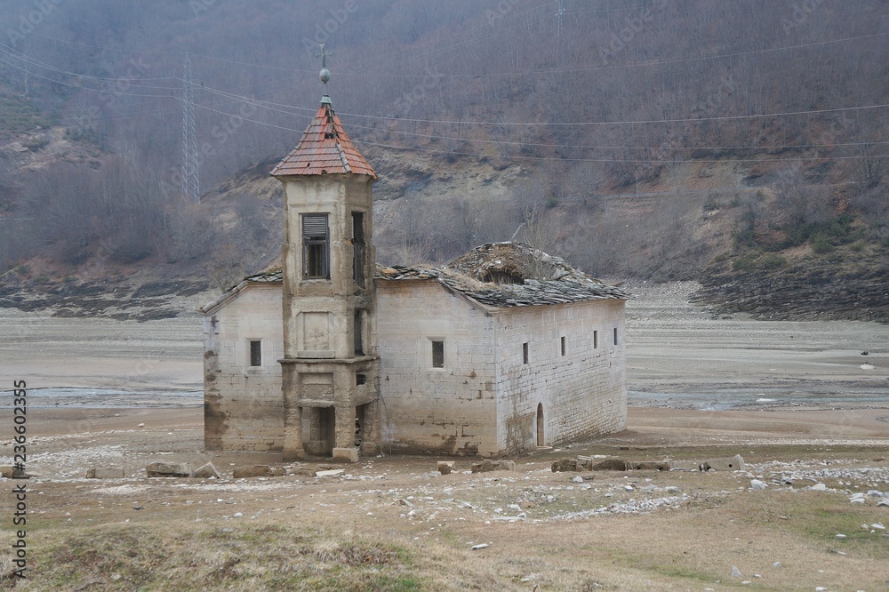 The St Nicholas Church near Mavrovo lake in Macedonia. It was built in 1853 and submerged in the lake in 1953
