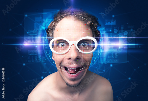 Facial recognition system. Young man on blue background