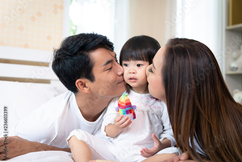 Happy family playing toy at home