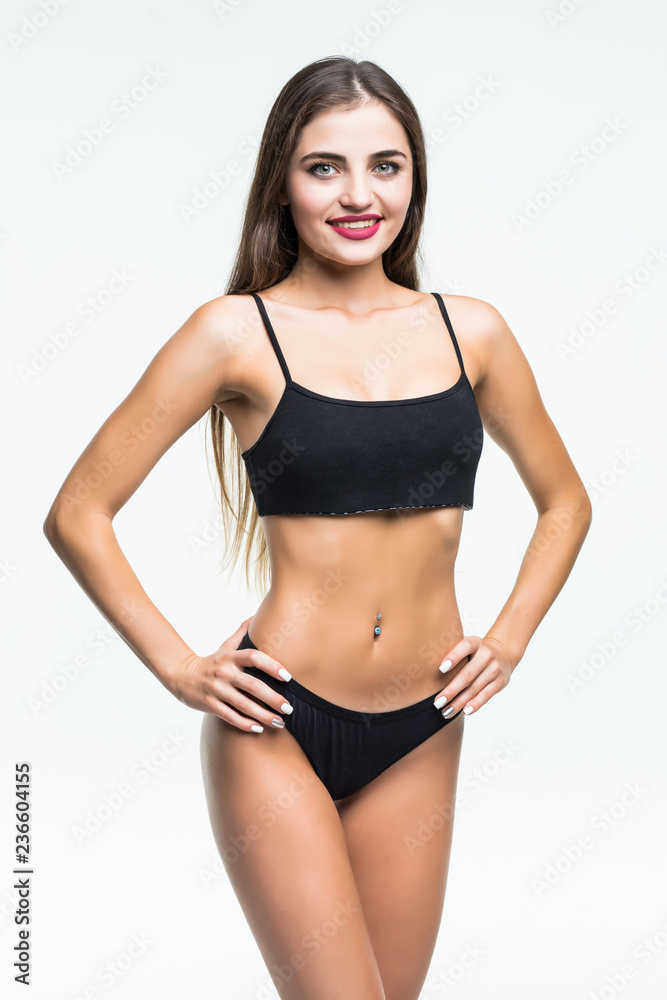 Beautiful woman with perfect figure in black underwear isolated on white background Beautiful woman with perfect figure in black underwear isolated on white background