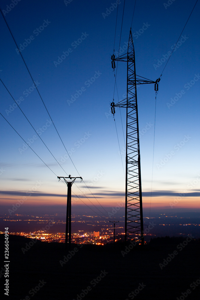 High voltage tower at sunset