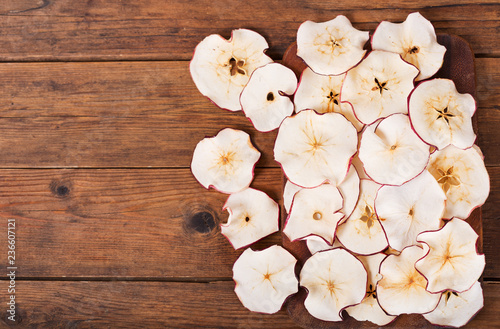 Wallpaper Mural dried apples on wooden table Torontodigital.ca