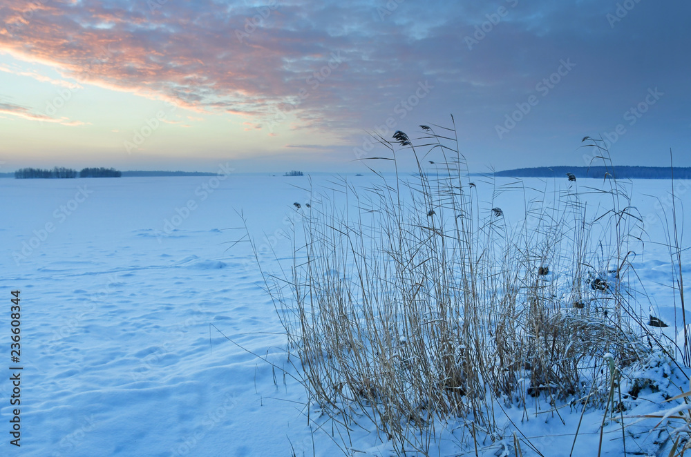 Sunrise over lake Uvildy in winter. South Ural, Chelyabinsk region, Russia Sunrise over lake Uvildy in winter. South Ural, Chelyabinsk region, Russia