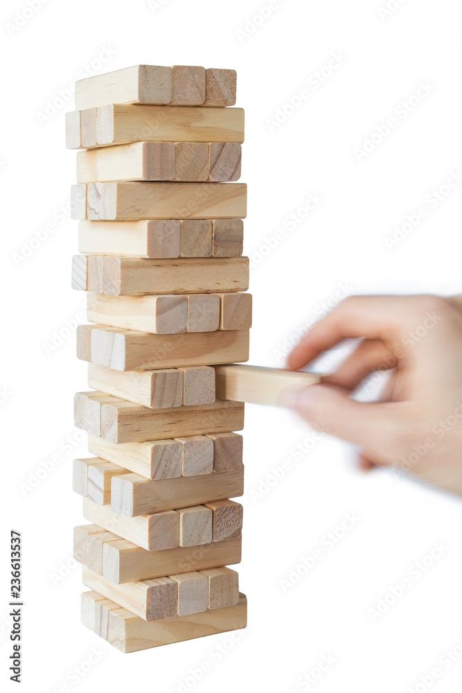 custom made wallpaper toronto digitalMan's hand taking first block or putting the last block to a sturdy tower of wooden blocks. Concept photo of planning, taking risks and strategizing. Hand is in motion. Isolated on white background.