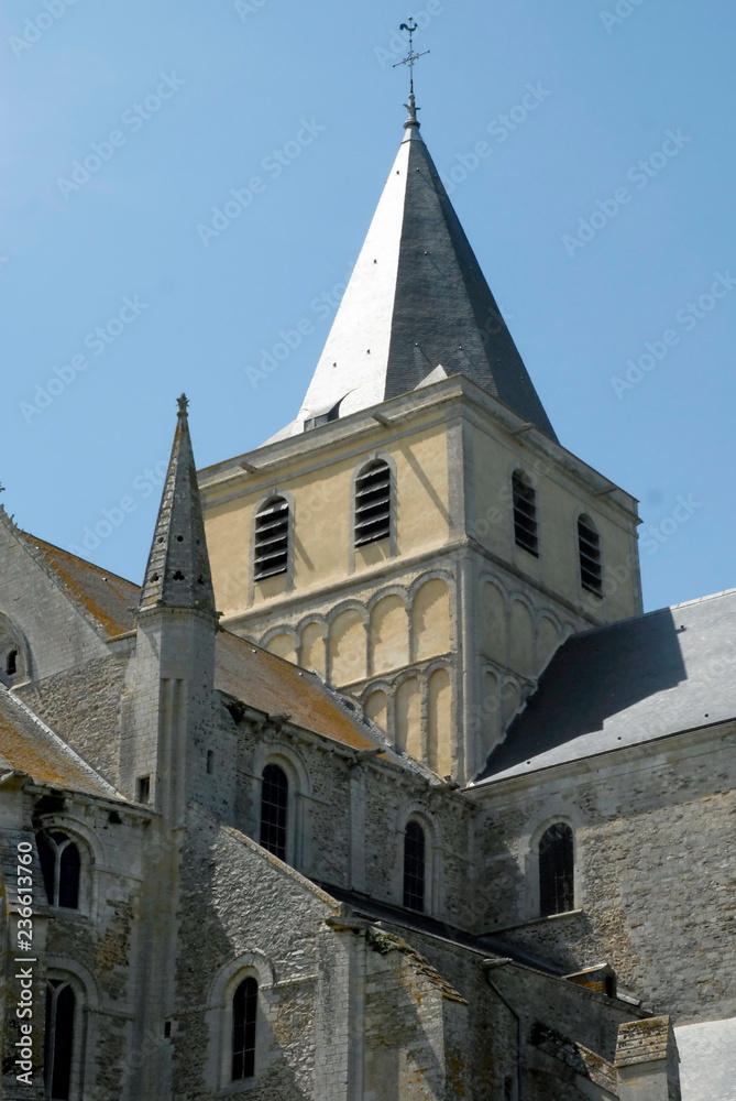 Fototapeta premium Clocher de l'abbaye de Cerizy-la-Forêt, perle de l’art roman, cette Abbaye fut fondée en 1032, département de la Manche, France 