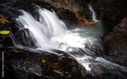 A small waterfall called the Seven Gorges Waterfall located in the Khao Yai National Park of Thailand.