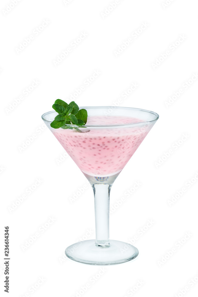 Glass of homemade strawberry yogurt with cia seeds and mint Glass of homemade strawberry yogurt with cia seeds and mint