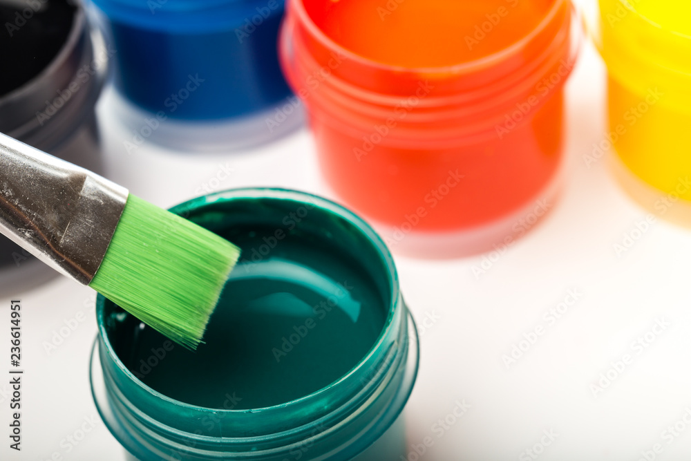 bottle paints on white, gouache, brush close up bottle paints on white, gouache, brush close up
