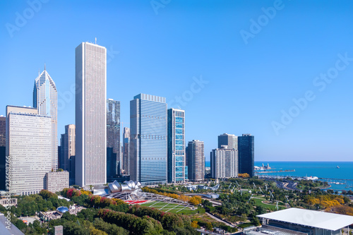 Downtown cityscape with office and residential towers and public attractions in the park. Chicago, USA. photo