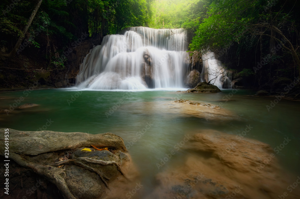 Obraz premium Huay mae khamin waterfall, this cascade is emerald green and popular in Kanchanaburi province, Thailand.