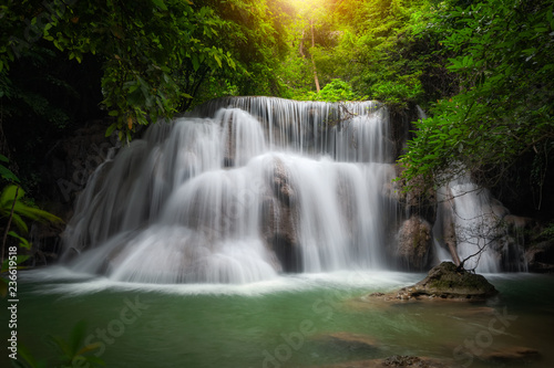 Fototapeta Naklejka Na Ścianę i Meble -  Huay mae khamin waterfall, this cascade is emerald green and popular in Kanchanaburi province, Thailand.