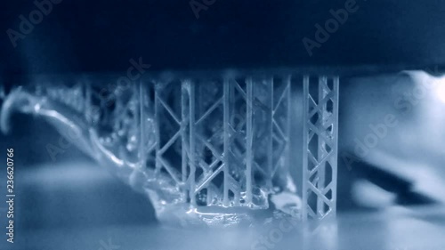 Stereolithography DPL, SLA 3d printer creating shape by UV polymerization. close-up. Progressive modern additive technology 3D printing. photo