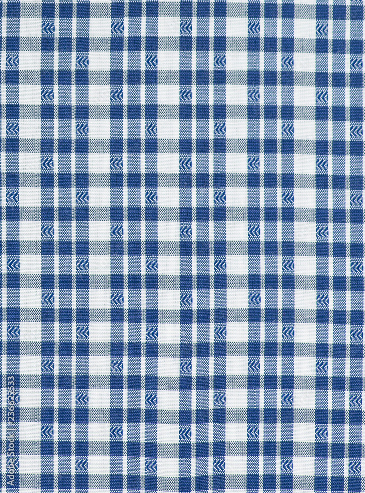 Background of the texture of the fabric. Cell pattern Background of the texture of the fabric. Cell pattern