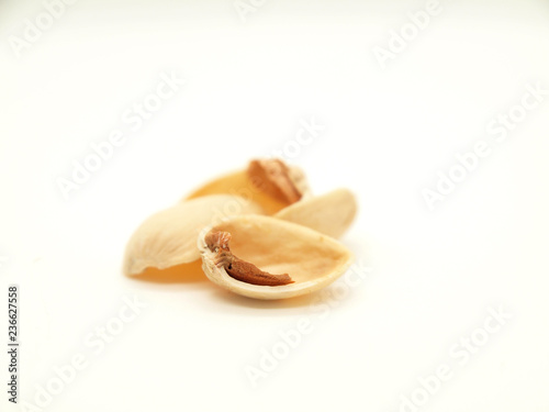 Pistachios fruit and shell on qhite background