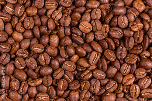 Background of many roasted coffee beans