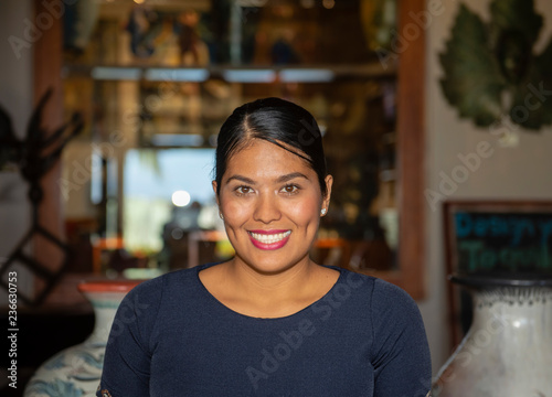 Happy, Smiling, Friendly & Beautiful Mexican Woman Working in a Resort Hotel in Punta de Mita, Nayarit, Mexico photo