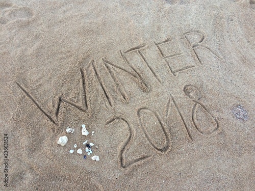 the inscription on the sand