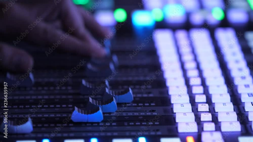 DJ sound engineer play club music on turntable mixer in studio DJ sound engineer play club music on turntable mixer in studio